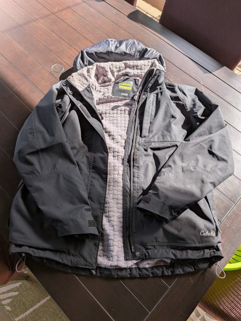 Black Cabela's women's winter parka featuring 4MOST DRY-PLUS waterproof - size L